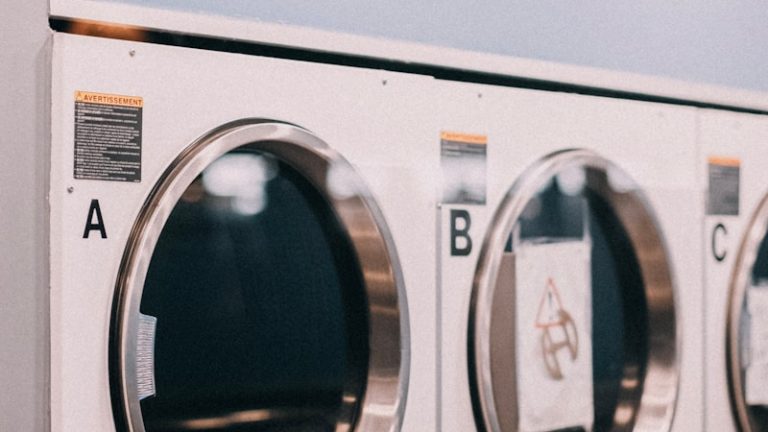 a row of washers sitting next to each other
