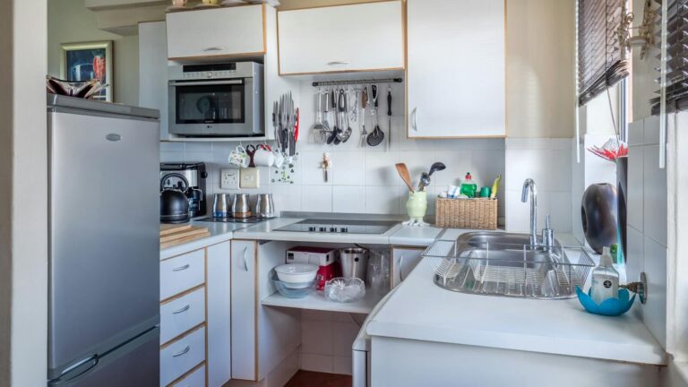 Sophisticated kitchen interior with modern appliances, wooden accents, and functional design.